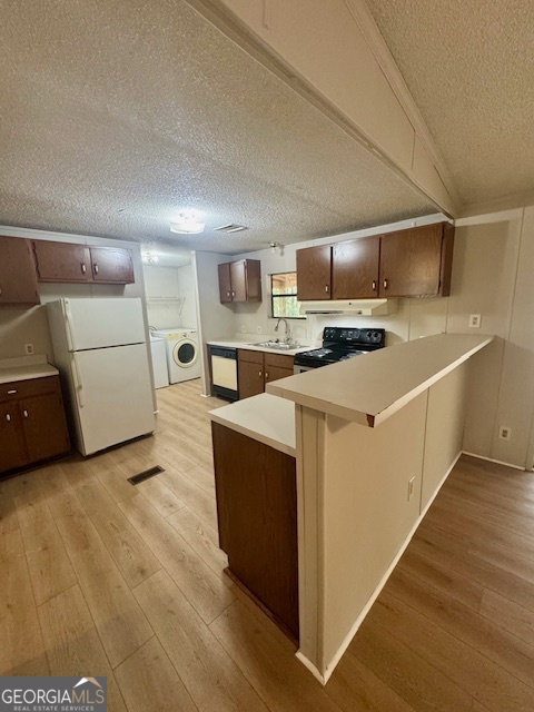 1769 Duncan Road Commerce, GA 30530 - Photo 6 of 16 a kitchen with a stove and a microwave