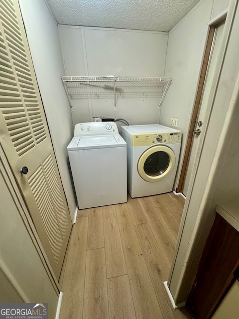 1769 Duncan Road Commerce, GA 30530 - Photo 7 of 16 a utility room with dryer and washer