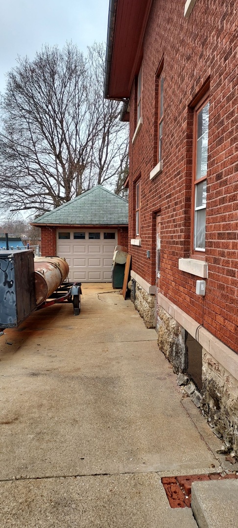 1231 South Float Avenue Freeport, IL 61032 - Photo 5 of 7 a view of car parked in front of building