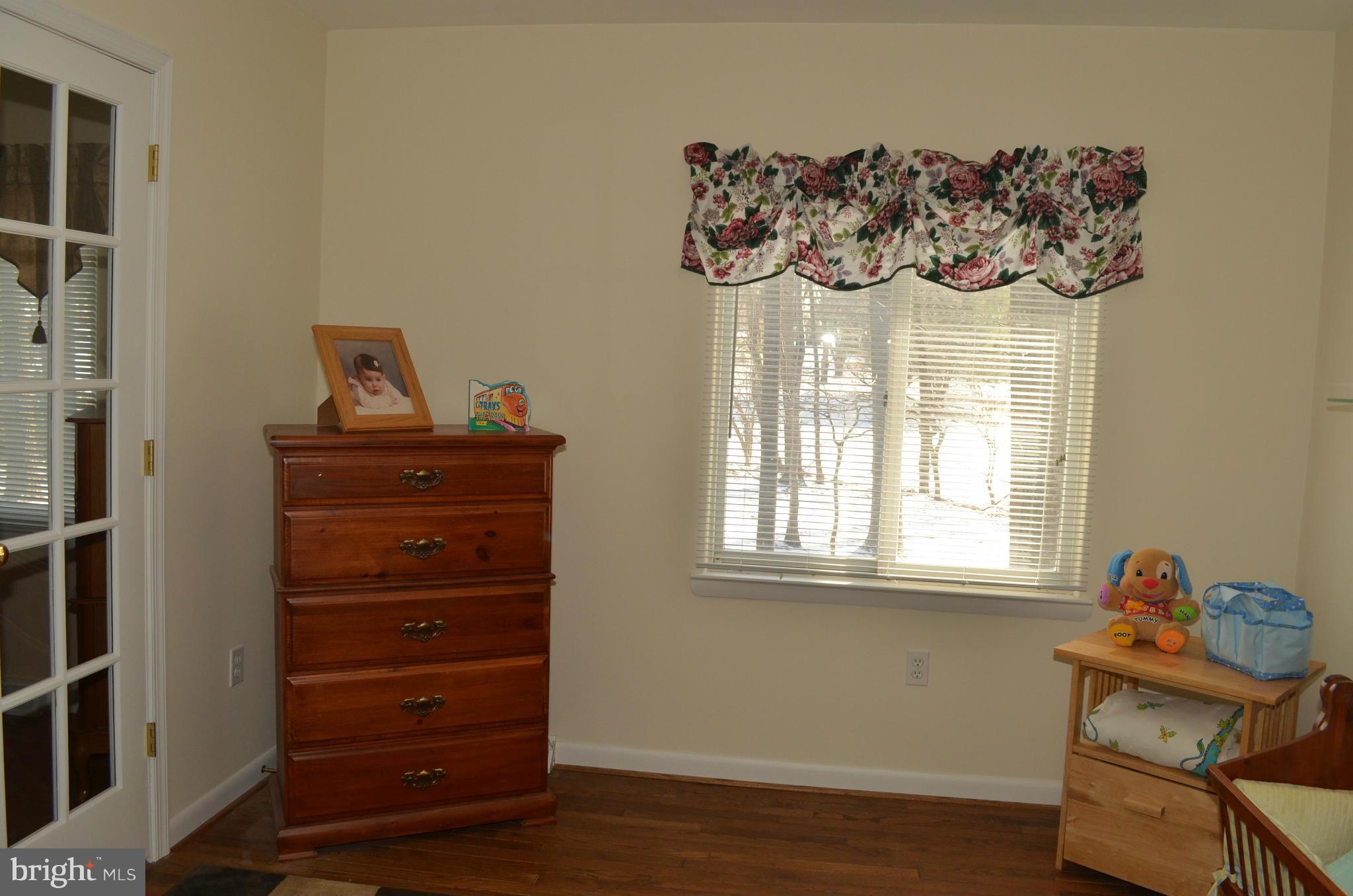 14314 Dairydale Road Baldwin, MD 21013 - Photo 24 of 27 a view of a window with a chandelier