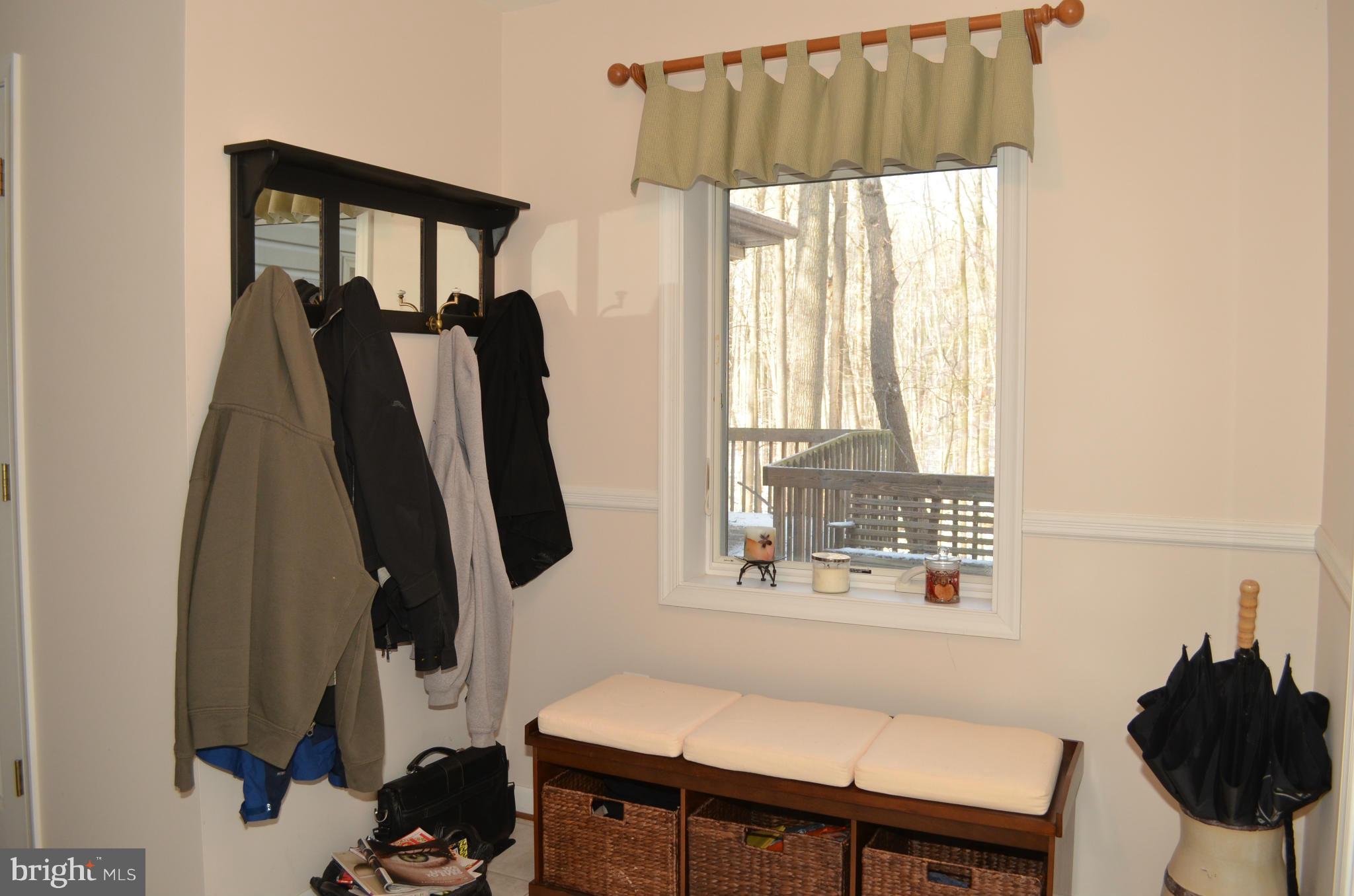 14314 Dairydale Road Baldwin, MD 21013 - Photo 9 of 27 a view of a room with a window and a wooden floor