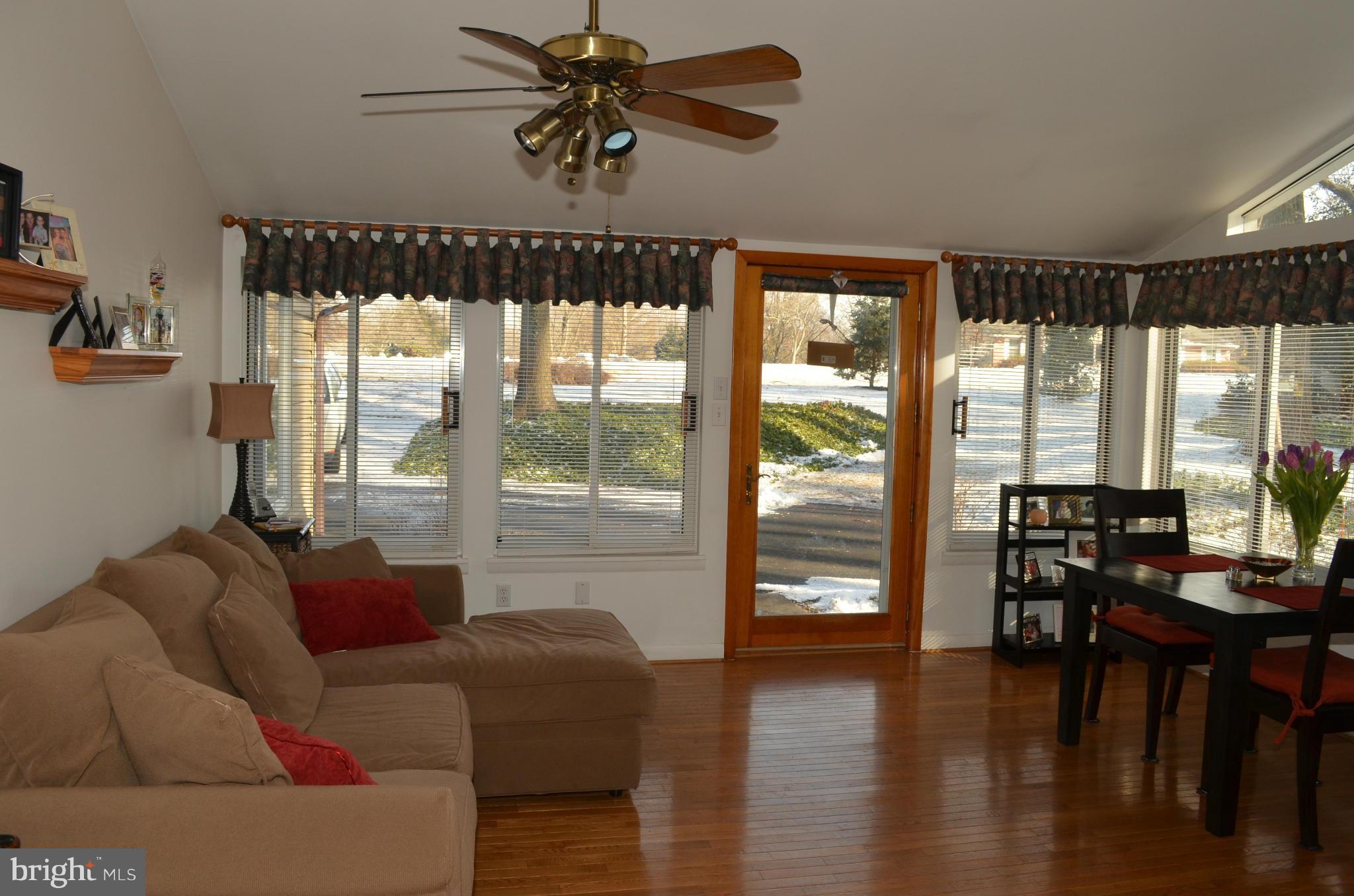 14314 Dairydale Road Baldwin, MD 21013 - Photo 10 of 27 a living room with furniture and a floor to ceiling window
