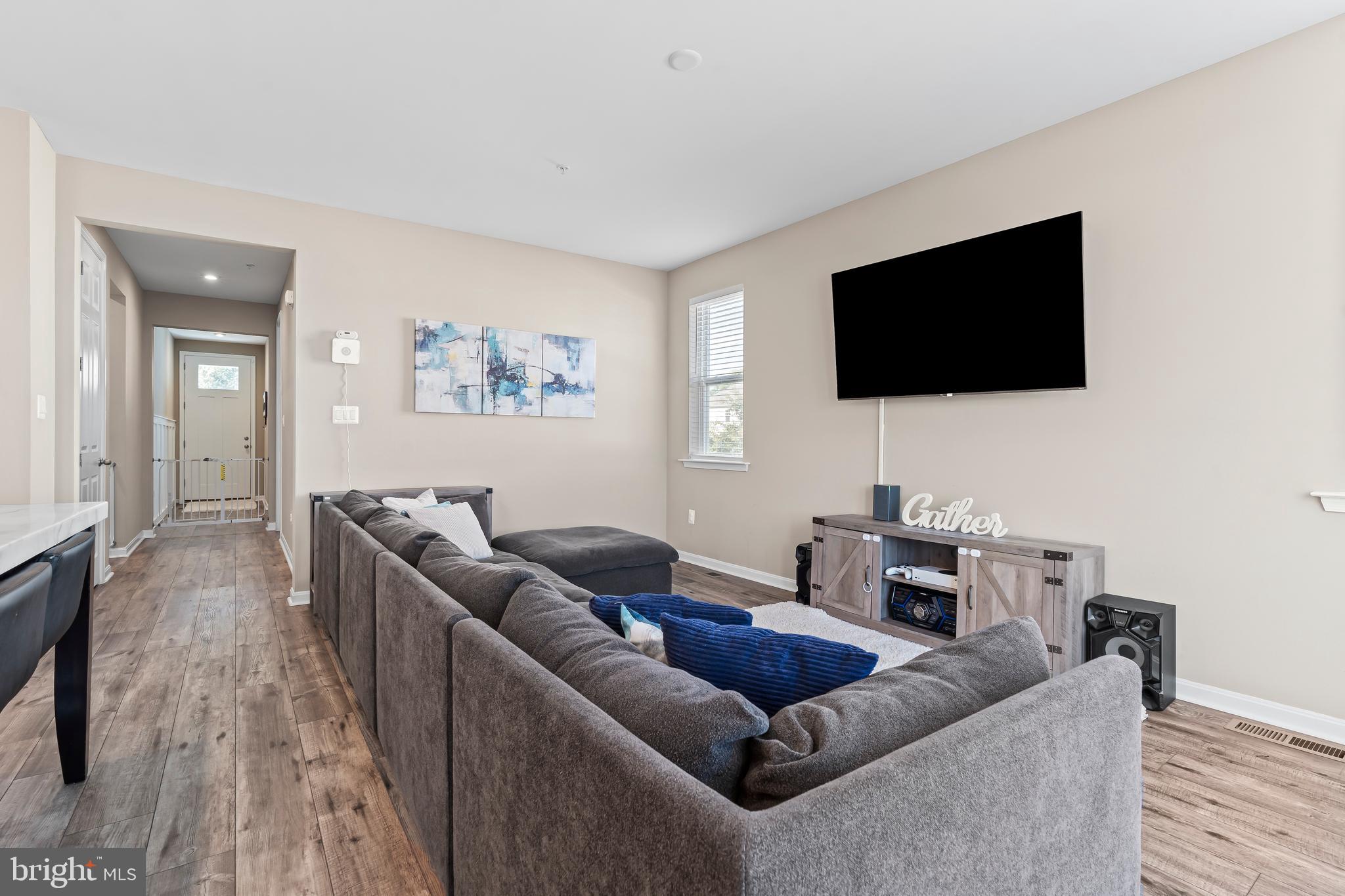 17330 Kilpatrick Court Hagerstown, MD 21740 - Photo 11 of 31 a living room with furniture and a flat screen tv