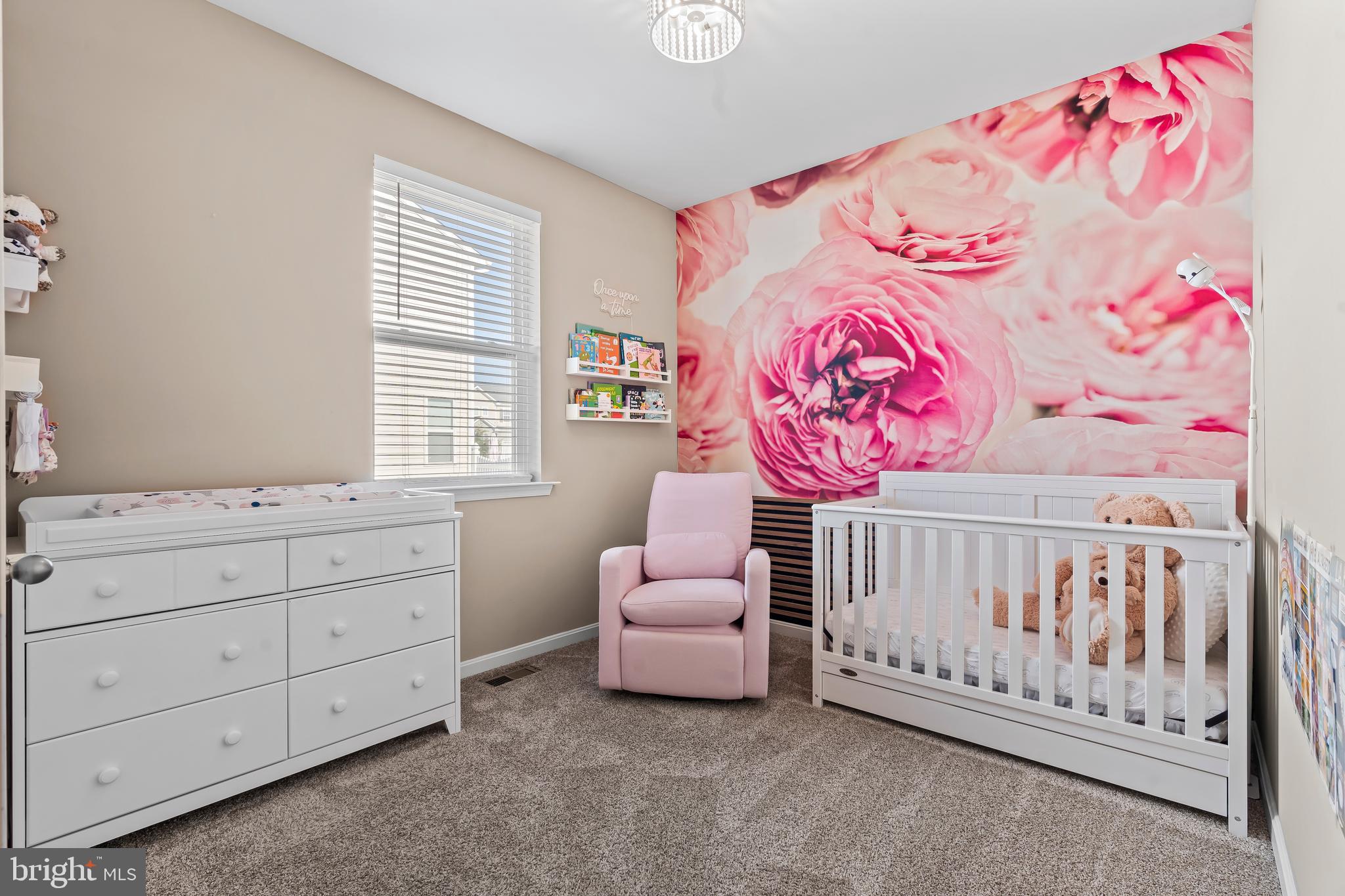17330 Kilpatrick Court Hagerstown, MD 21740 - Photo 26 of 31 a bedroom with a baby bed a dresser and a window