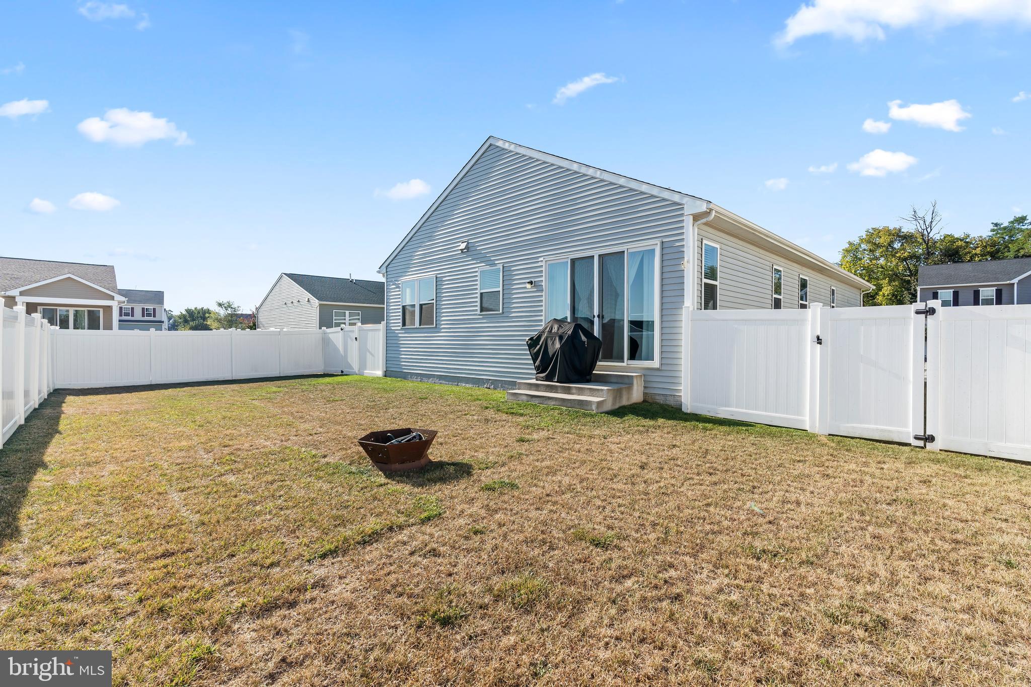 17330 Kilpatrick Court Hagerstown, MD 21740 - Photo 5 of 31 a view of a house with backyard and a garden