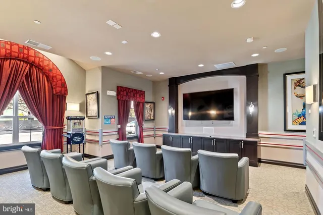 a living room with a couch and a flat screen tv