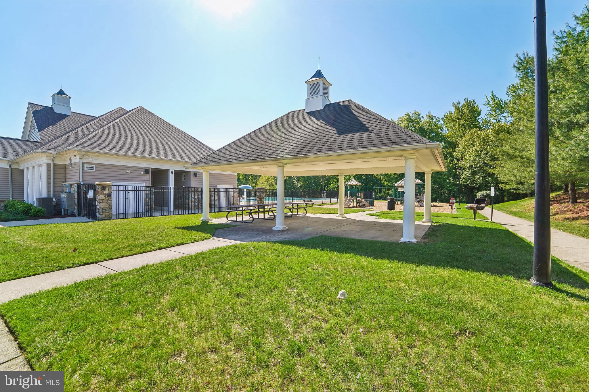 1461 Pangbourne Way Hanover, MD 21076 - Photo 43 of 51 a patio table and chairs with the garden view