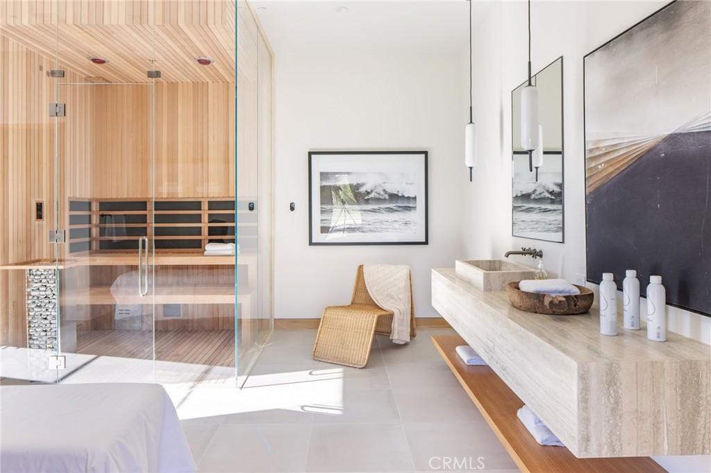 24050 Hidden Ridge Road Hidden Hills, CA 91302 - Photo 19 of 45 a bedroom with furniture and a window