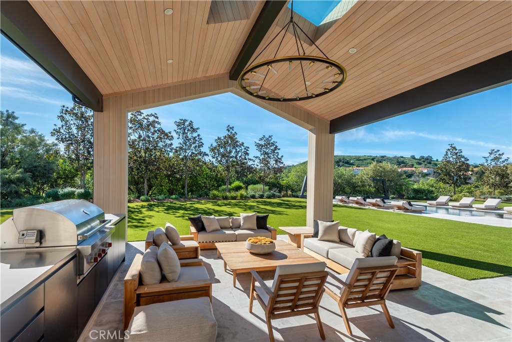 24050 Hidden Ridge Road Hidden Hills, CA 91302 - Photo 34 of 45 a view of yard with patio