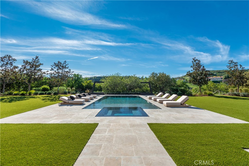 24050 Hidden Ridge Road Hidden Hills, CA 91302 - Photo 39 of 45 a view of a backyard