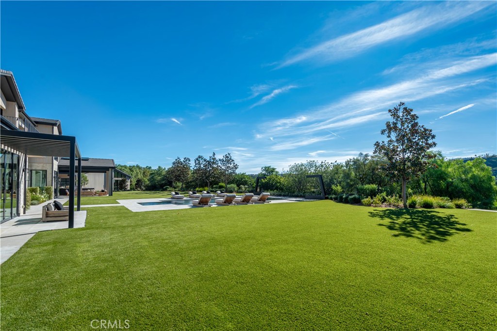 24050 Hidden Ridge Road Hidden Hills, CA 91302 - Photo 40 of 45 a view of an outdoor space and basketball court