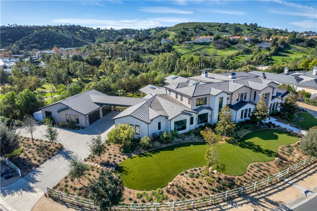 24050 Hidden Ridge Road Hidden Hills, CA 91302 - Photo 42 of 45 an aerial view of a house with a garden