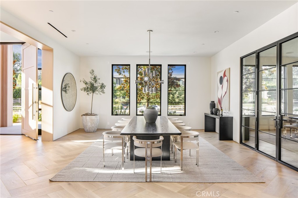 24050 Hidden Ridge Road Hidden Hills, CA 91302 - Photo 7 of 45 a living room with furniture and a large window