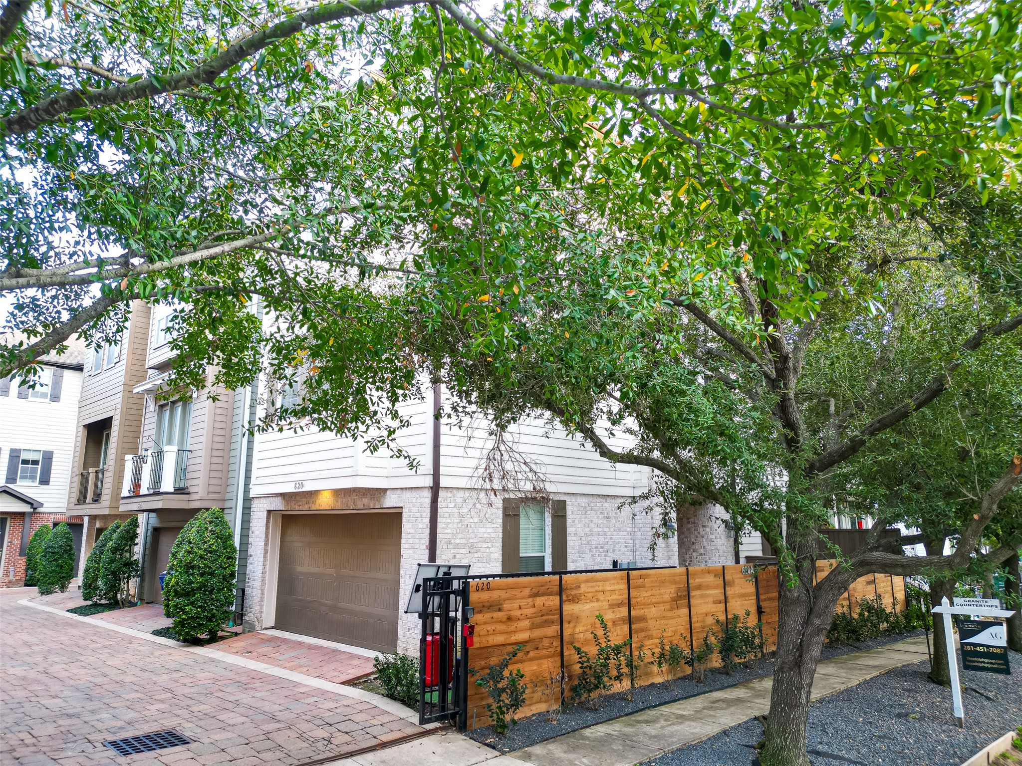 620 Rutland Street, Unit A Houston, TX 77007 - Photo 4 of 46 Charming house with a modern exterior, featuring a spacious garage and a private fenced yard. Nestled in a cozy neighborhood, the property is surrounded by lush greenery and offers a welcoming atmosphere.