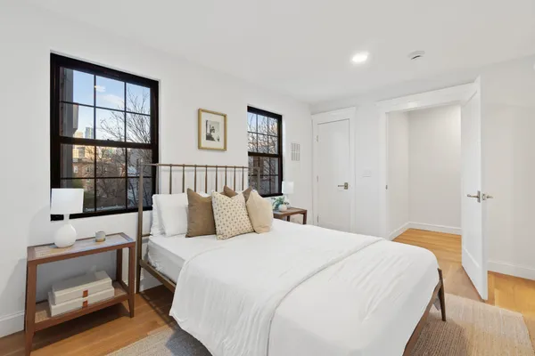 a view of wooden floor and in the bathroom