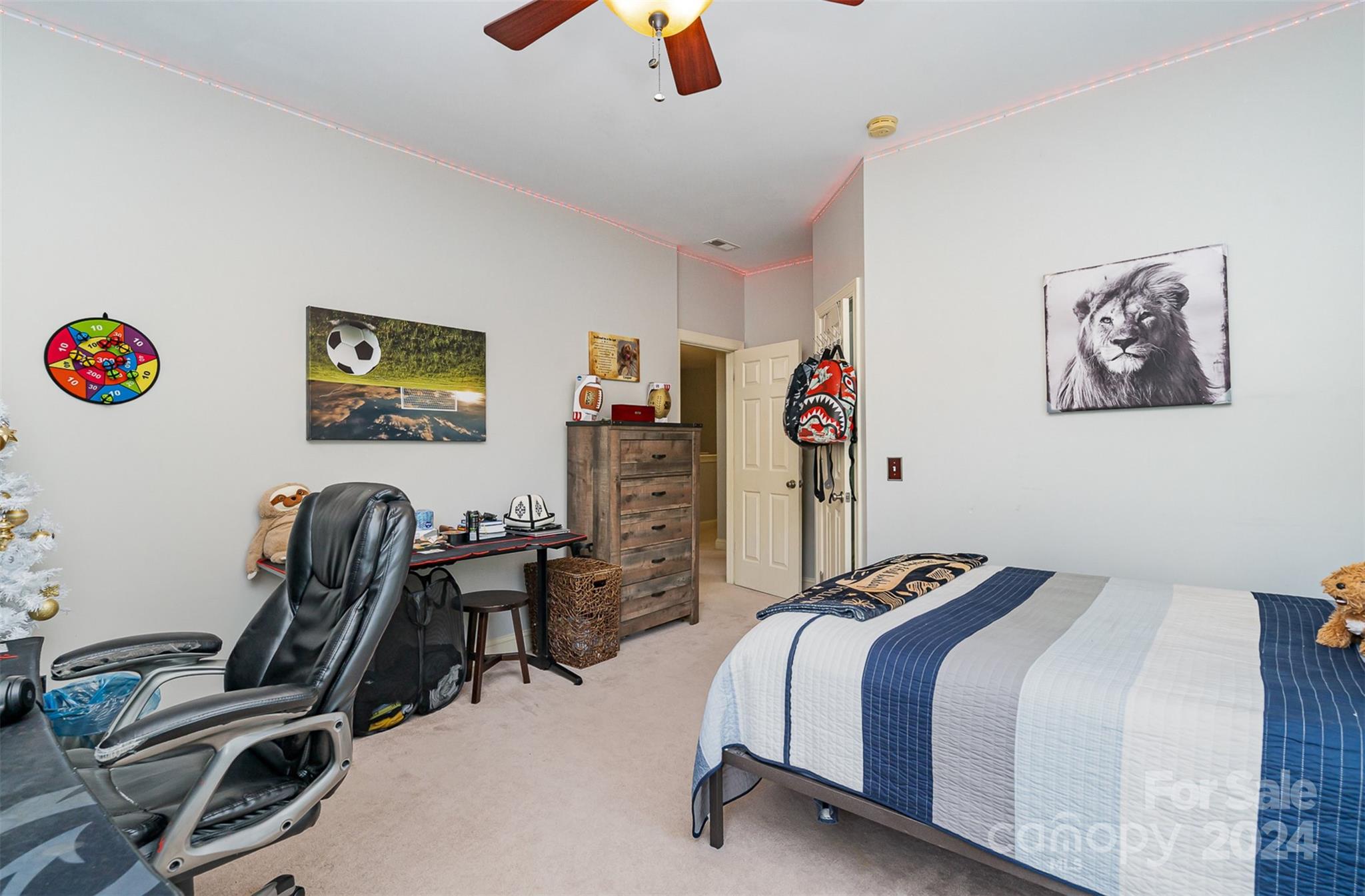 5324 Maddox Court Fort Mill, SC 29708 - Photo 30 of 48 a bedroom with bed and a bookshelf