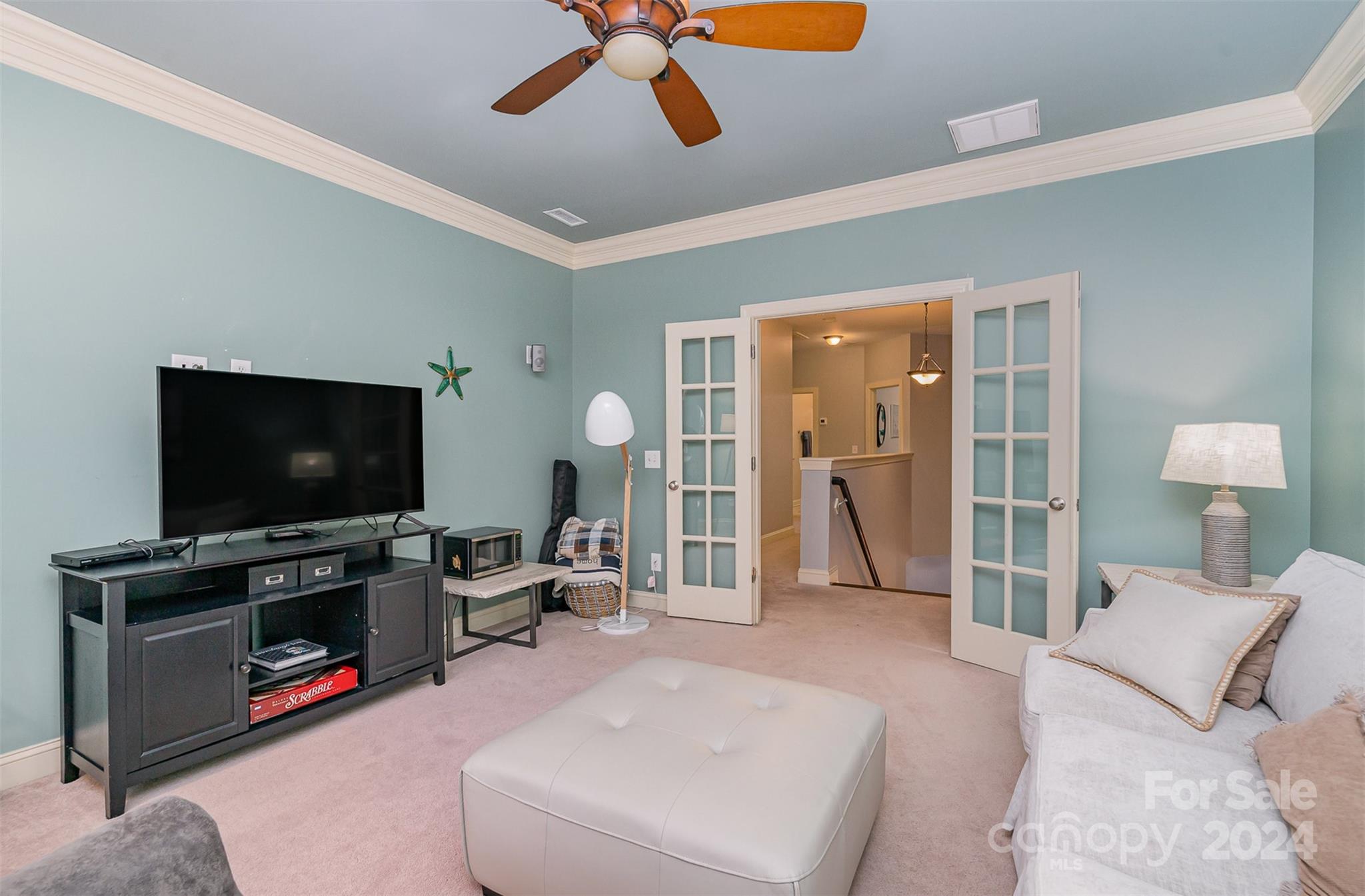 5324 Maddox Court Fort Mill, SC 29708 - Photo 35 of 48 a living room with furniture and a flat screen tv