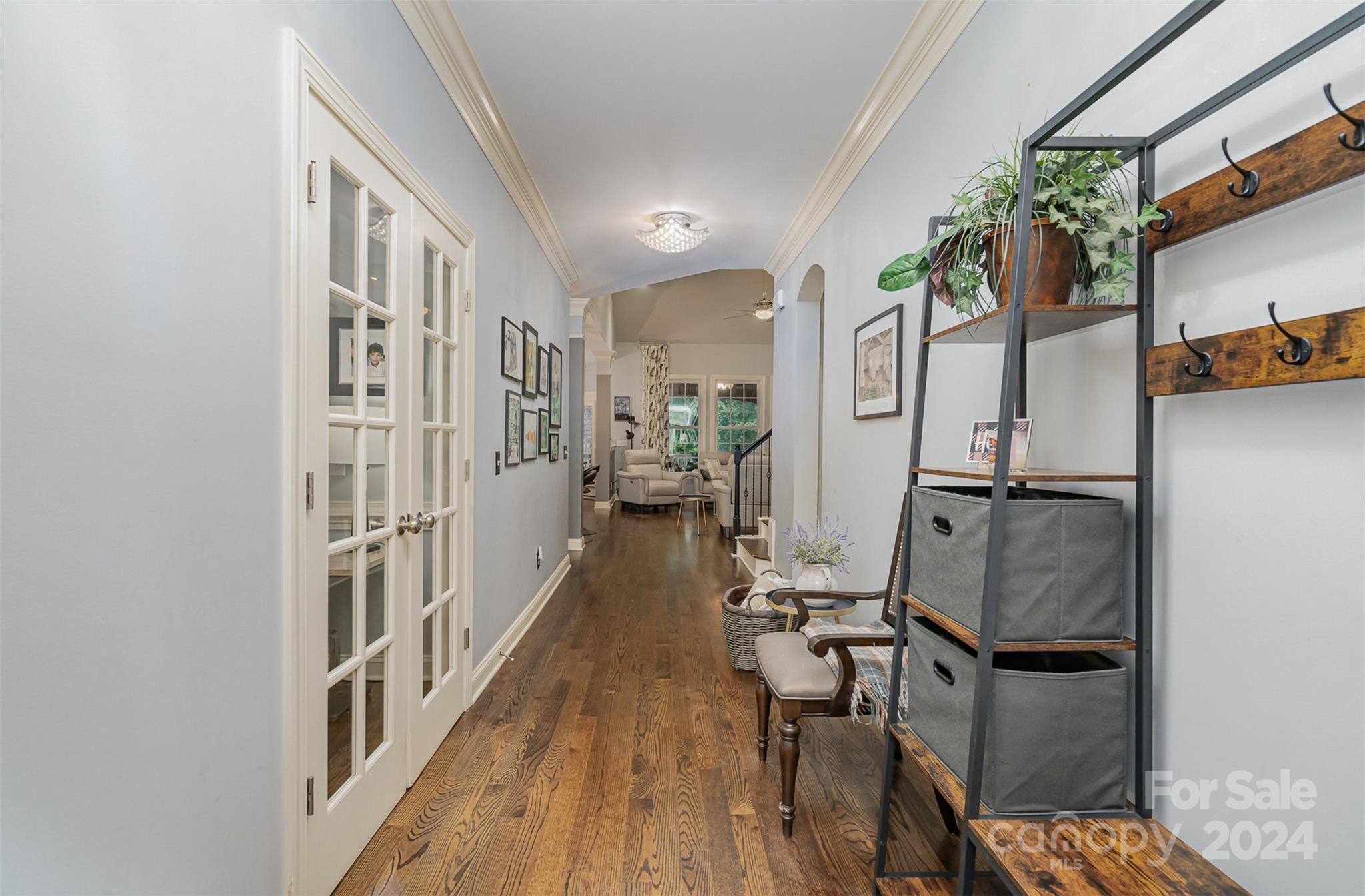 5324 Maddox Court Fort Mill, SC 29708 - Photo 4 of 48 a view of a hallway with paintings on the wall