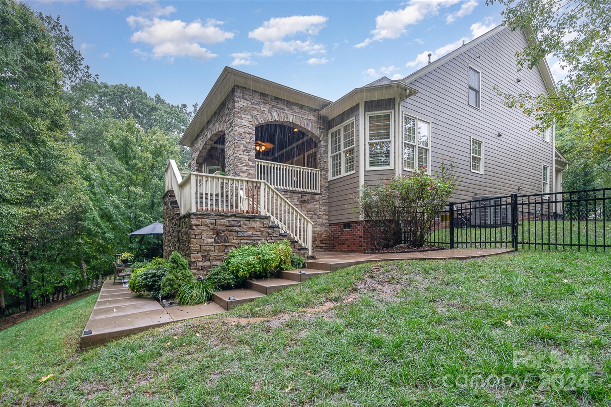 5324 Maddox Court Fort Mill, SC 29708 - Photo 42 of 48 a view of a house with a yard and plants