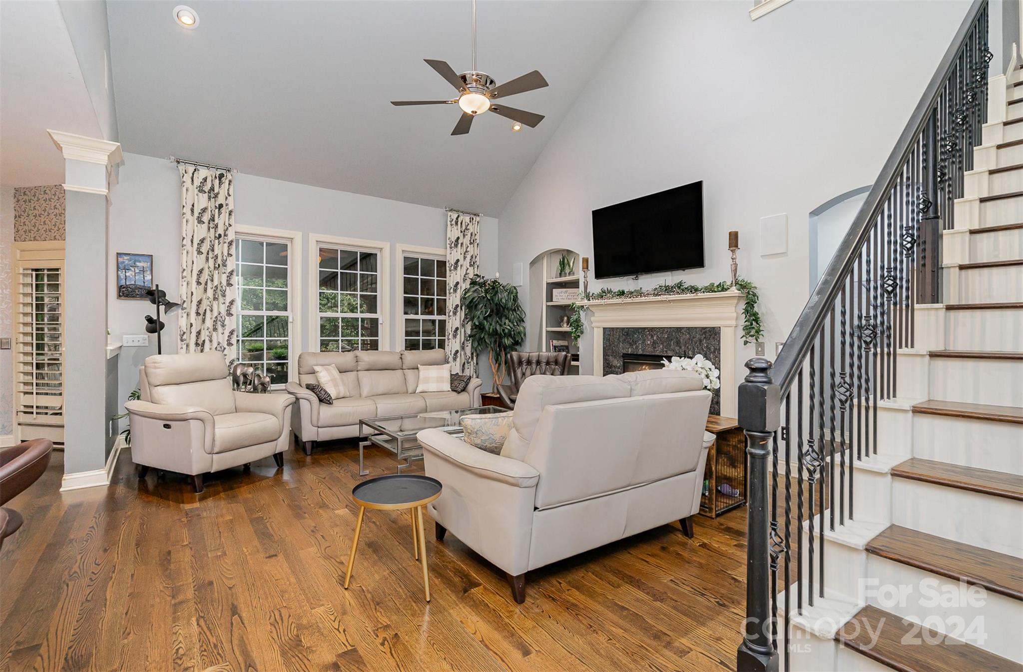 5324 Maddox Court Fort Mill, SC 29708 - Photo 7 of 48 a living room with furniture fireplace and a flat screen tv
