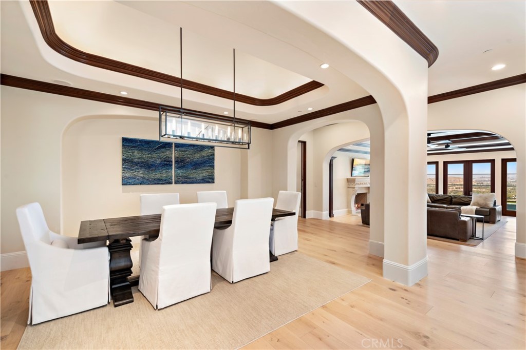 3 Fox Hole Road Ladera Ranch, CA 92694 - Photo 13 of 57 a living room with furniture a flat screen tv and a chandelier