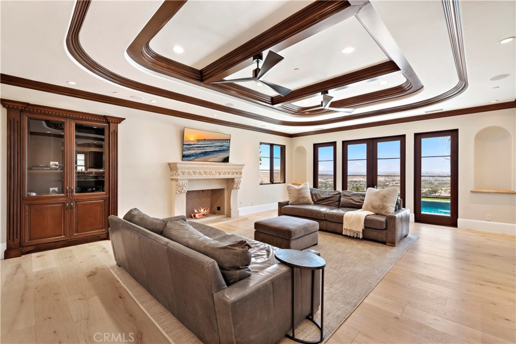 3 Fox Hole Road Ladera Ranch, CA 92694 - Photo 17 of 57 a living room with furniture and a fireplace