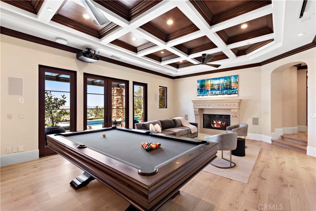 3 Fox Hole Road Ladera Ranch, CA 92694 - Photo 22 of 57 a living room with stainless steel fireplace furniture and a fireplace