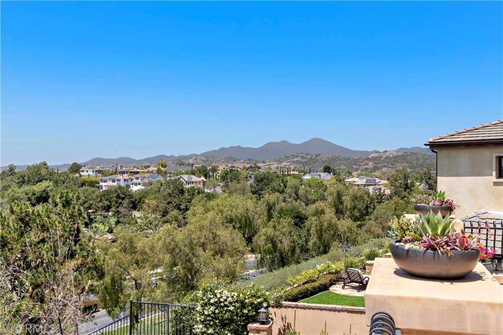 3 Fox Hole Road Ladera Ranch, CA 92694 - Photo 39 of 57 a view of a terrace with a chair and potted plants