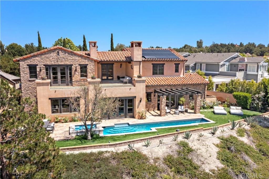 3 Fox Hole Road Ladera Ranch, CA 92694 - Photo 4 of 57 a front view of residential houses with yard and trees