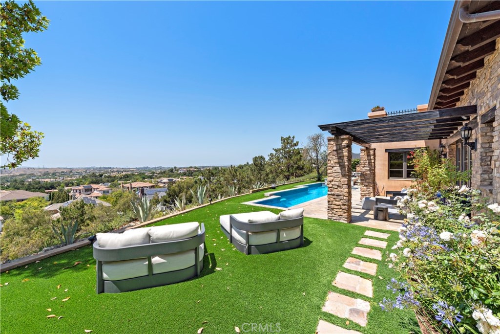 3 Fox Hole Road Ladera Ranch, CA 92694 - Photo 45 of 57 a view of a patio with chairs and a table