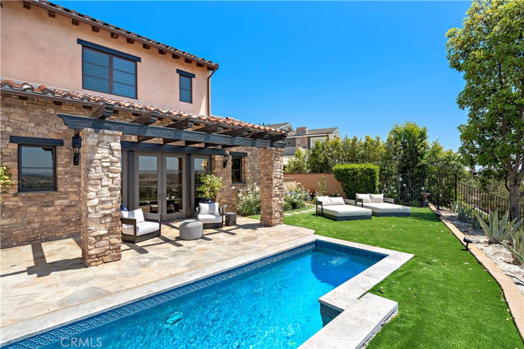 3 Fox Hole Road Ladera Ranch, CA 92694 - Photo 47 of 57 a view of a house with swimming pool and sitting area