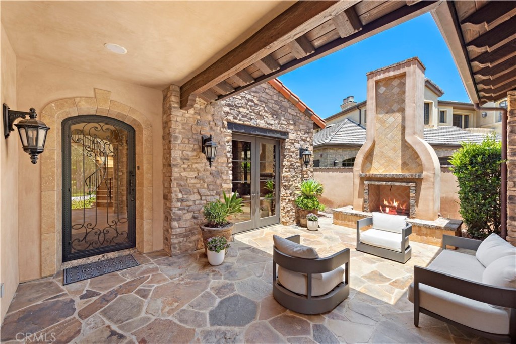 3 Fox Hole Road Ladera Ranch, CA 92694 - Photo 9 of 57 a view of a patio with couches table and chairs and potted plants
