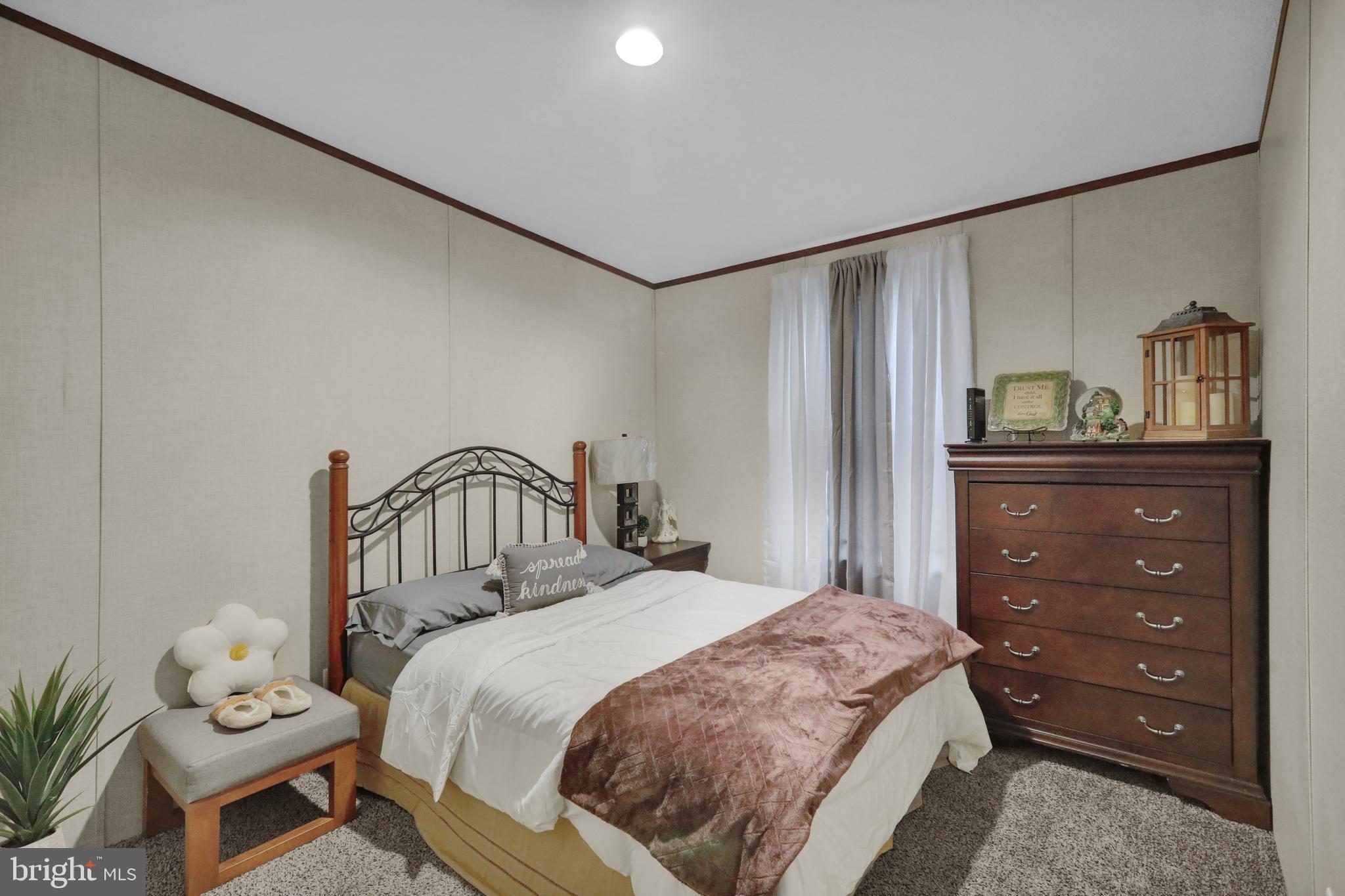 21 Keystone Road Reading, PA 19606 - Photo 20 of 22 a bedroom with a bed and a dresser in it