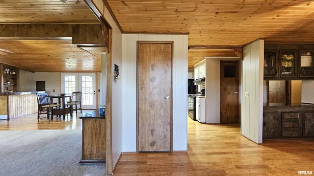 a view of a lobby with furniture and floor to ceiling window