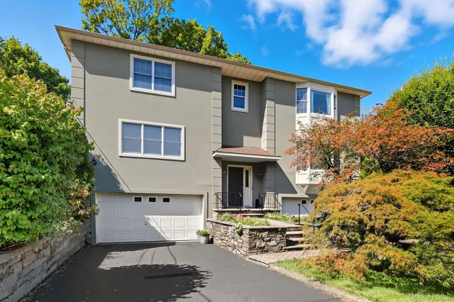 a living room with furniture pool table and a large window