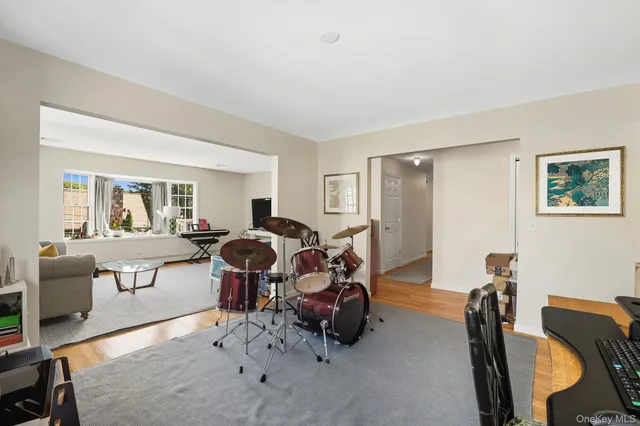 a workspace with furniture and wooden floor