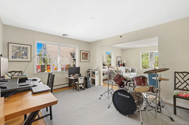 a kitchen with appliances a sink and cabinets