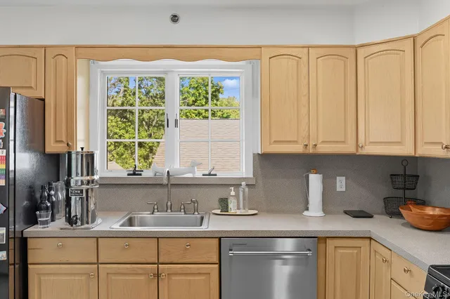 a view of a balcony with wooden floor