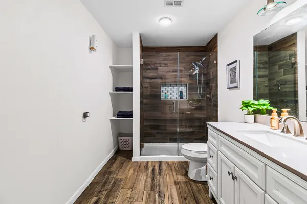 a view of a swimming pool and an outdoor seating