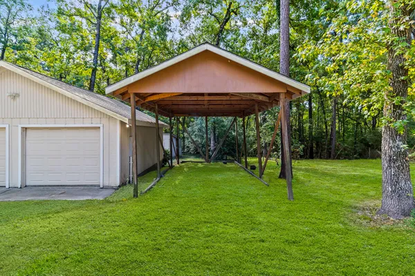 a kitchen with stove cabinets and stainless steel appliances