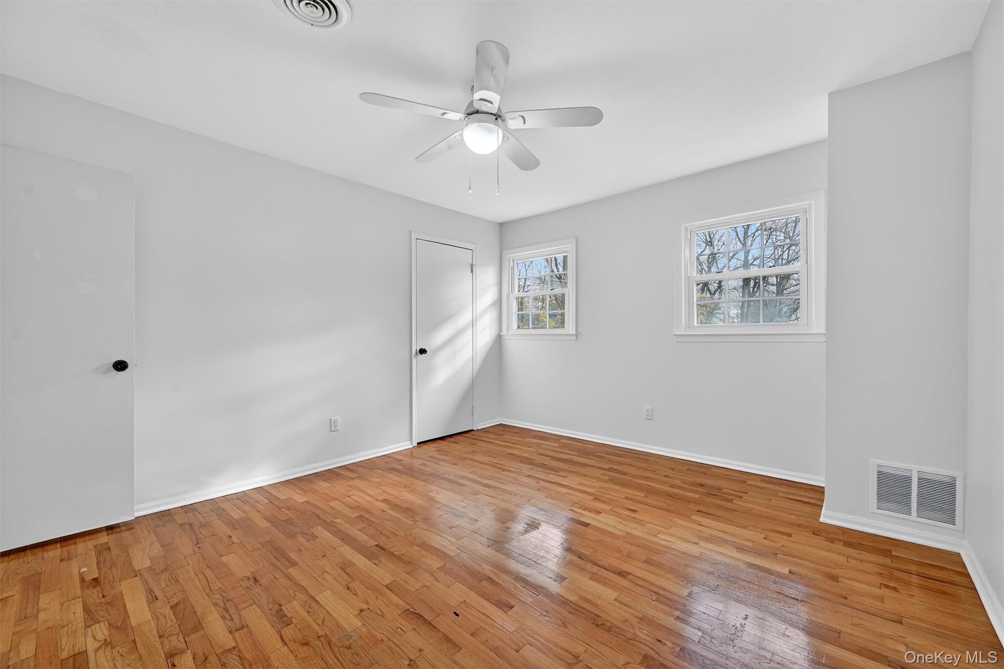 28 Alan Road Spring Valley, NY 10977 - Photo 18 of 39 a view of an empty room with wooden floor