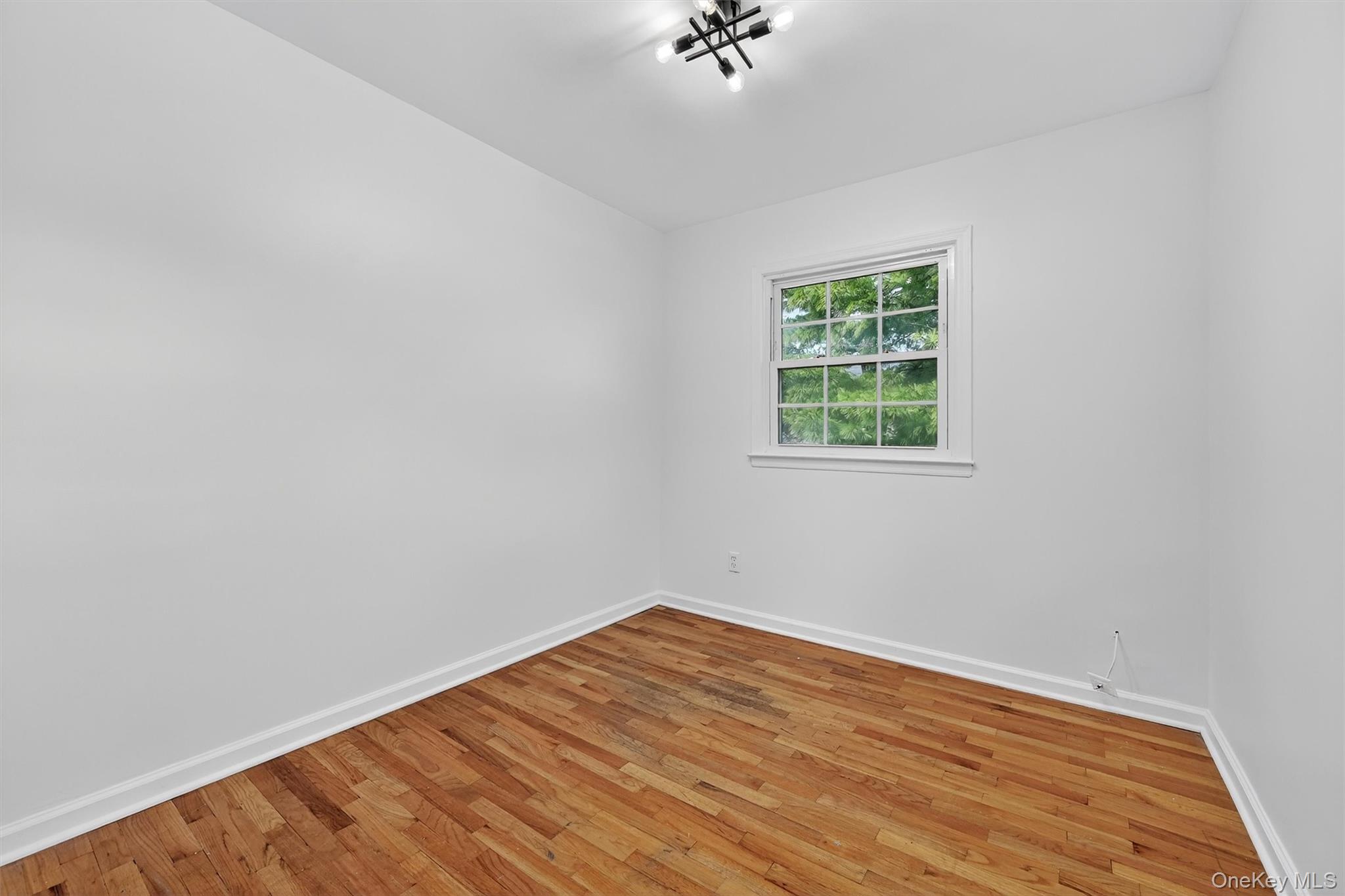 28 Alan Road Spring Valley, NY 10977 - Photo 22 of 39 an empty room with a window