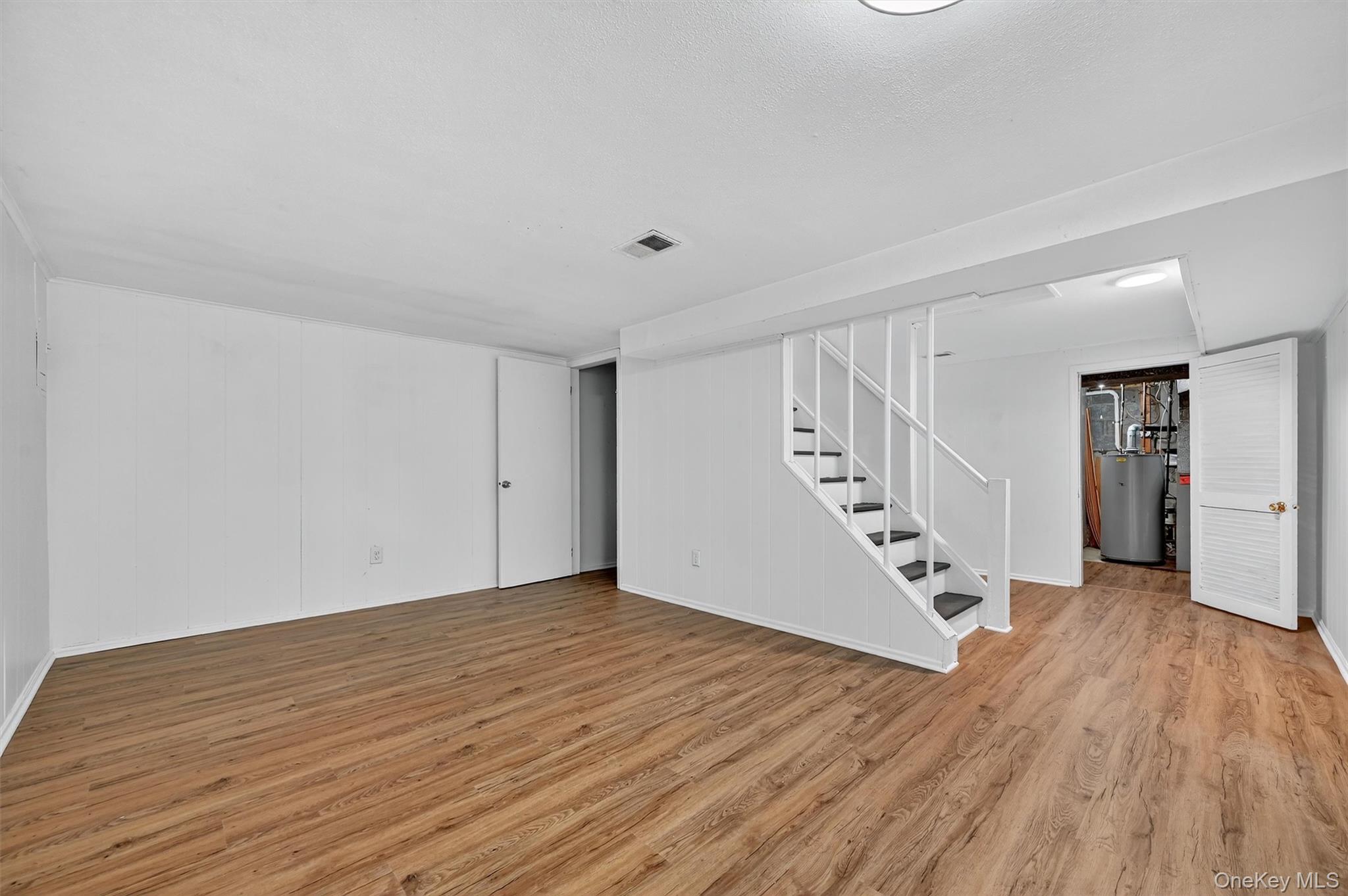28 Alan Road Spring Valley, NY 10977 - Photo 27 of 39 a view of an empty room with wooden floor