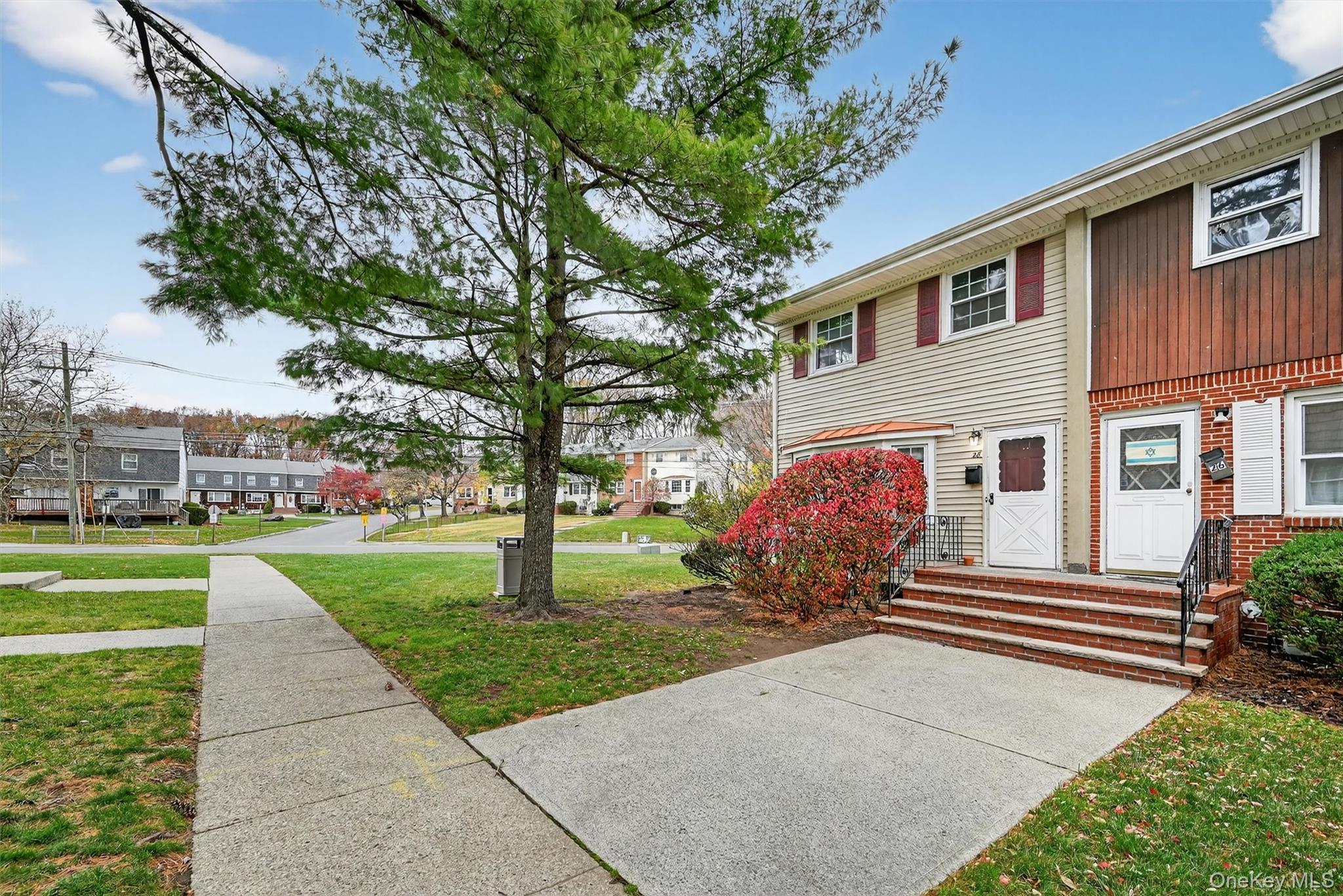 28 Alan Road Spring Valley, NY 10977 - Photo 4 of 39 a front view of a house with garden