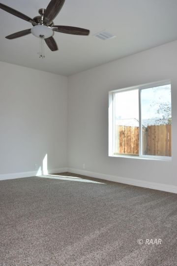 556 South Alvord Street Ridgecrest, CA 93555 - Photo 20 of 28 a view of an empty room with a window