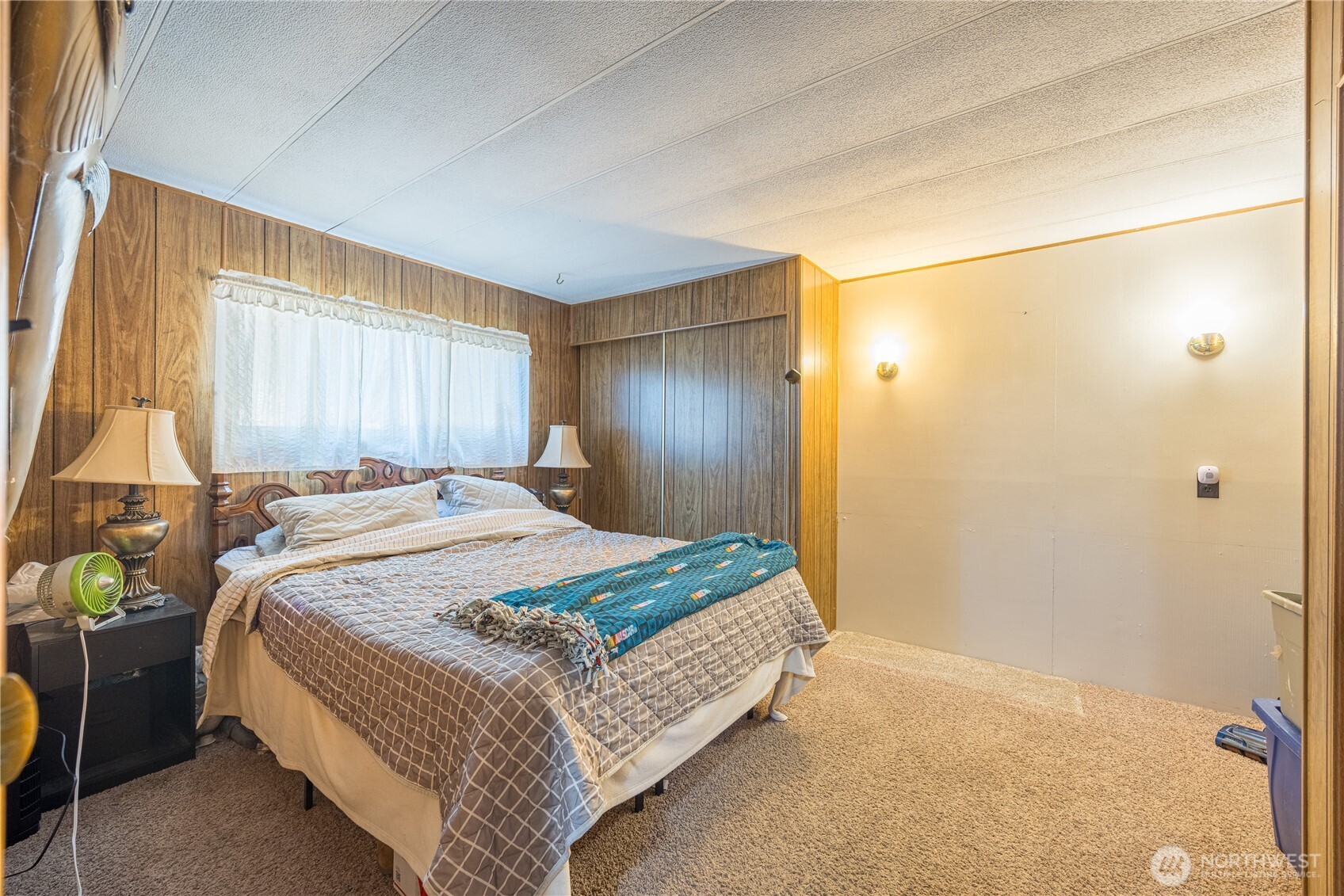 251 Gossett Road Port Angeles, WA 98363 - Photo 15 of 21 a bedroom with a bed and a window