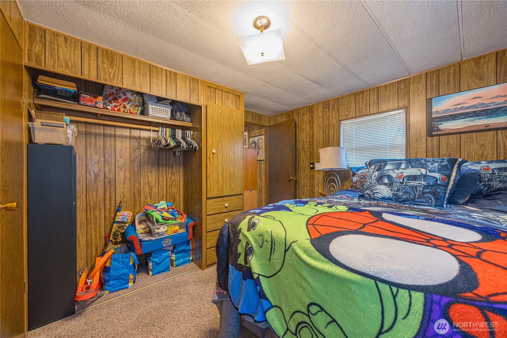 251 Gossett Road Port Angeles, WA 98363 - Photo 18 of 21 a bedroom with bed and a window