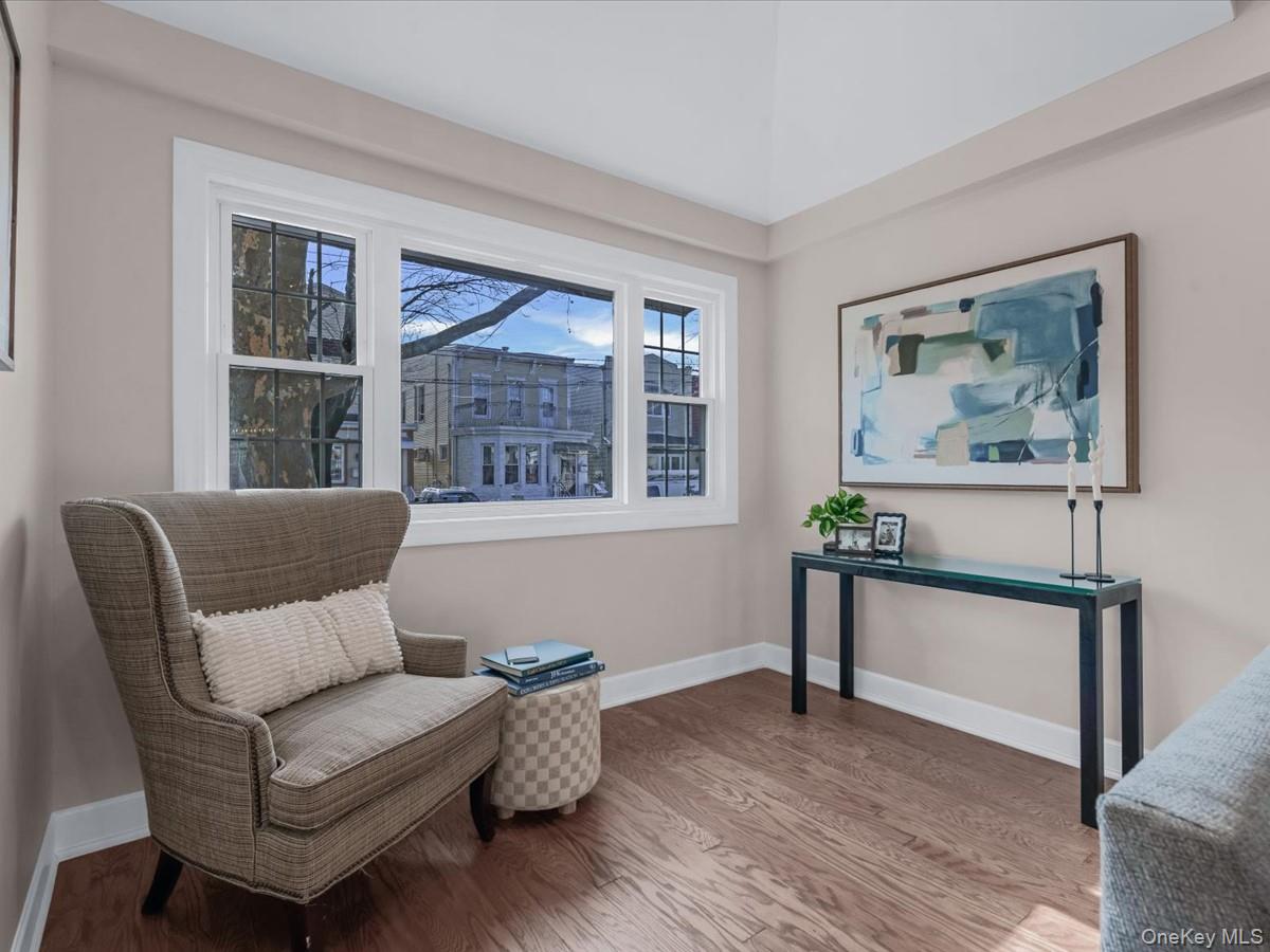 80-49 88th Avenue Queens, NY 11421 - Photo 6 of 28 a living room with furniture and a window