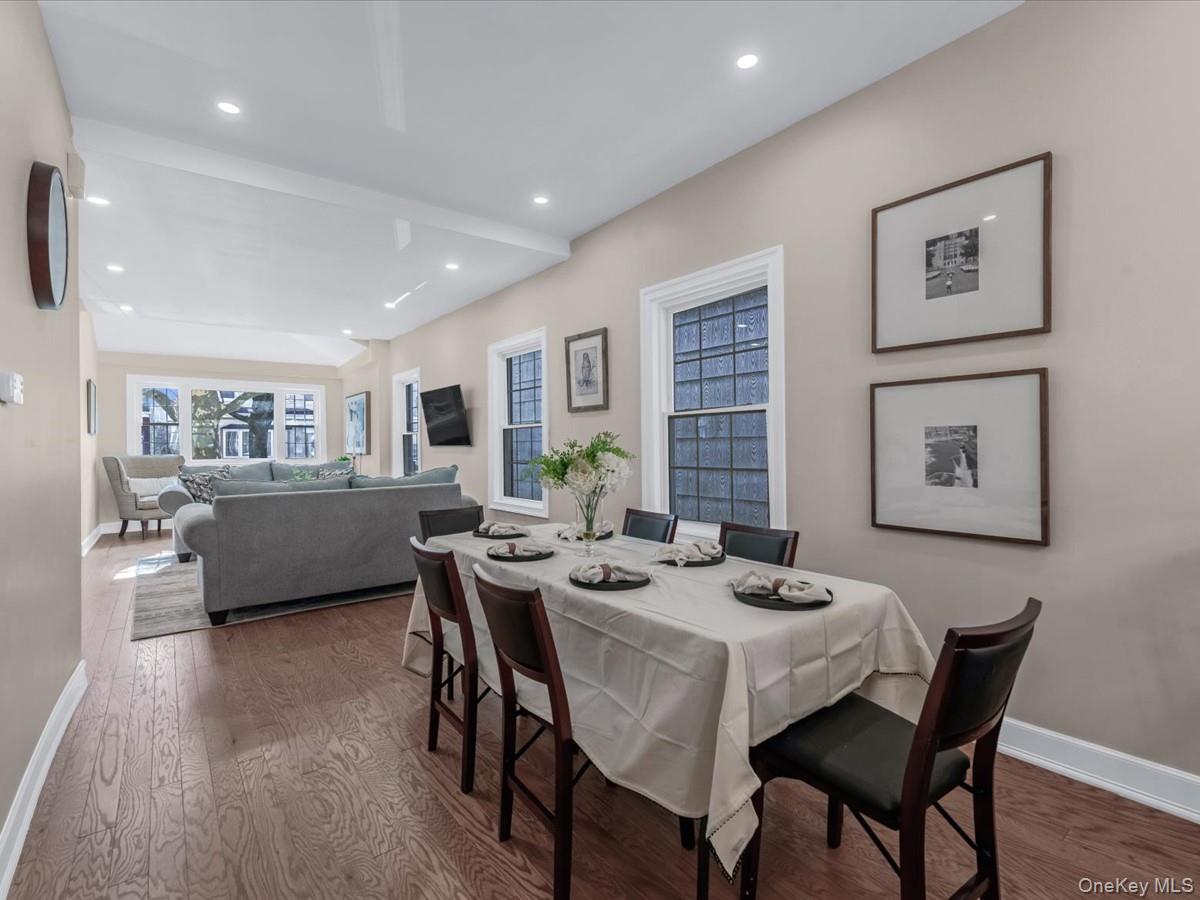 80-49 88th Avenue Queens, NY 11421 - Photo 9 of 28 a dining room with furniture and window