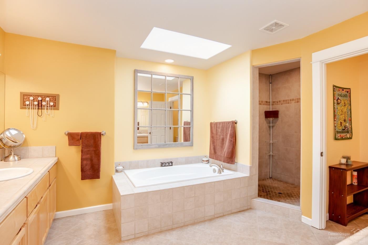 2429 Northwest Skyline Ranch Road Bend, OR 97703 - Photo 17 of 25 Skylight lit master bathroom with double